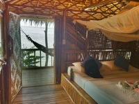 $18/night.  (Toh Kor Beach Resort - the cabin was like 550THB = ~18USD, and it was 1500THB when we came back in 2014)